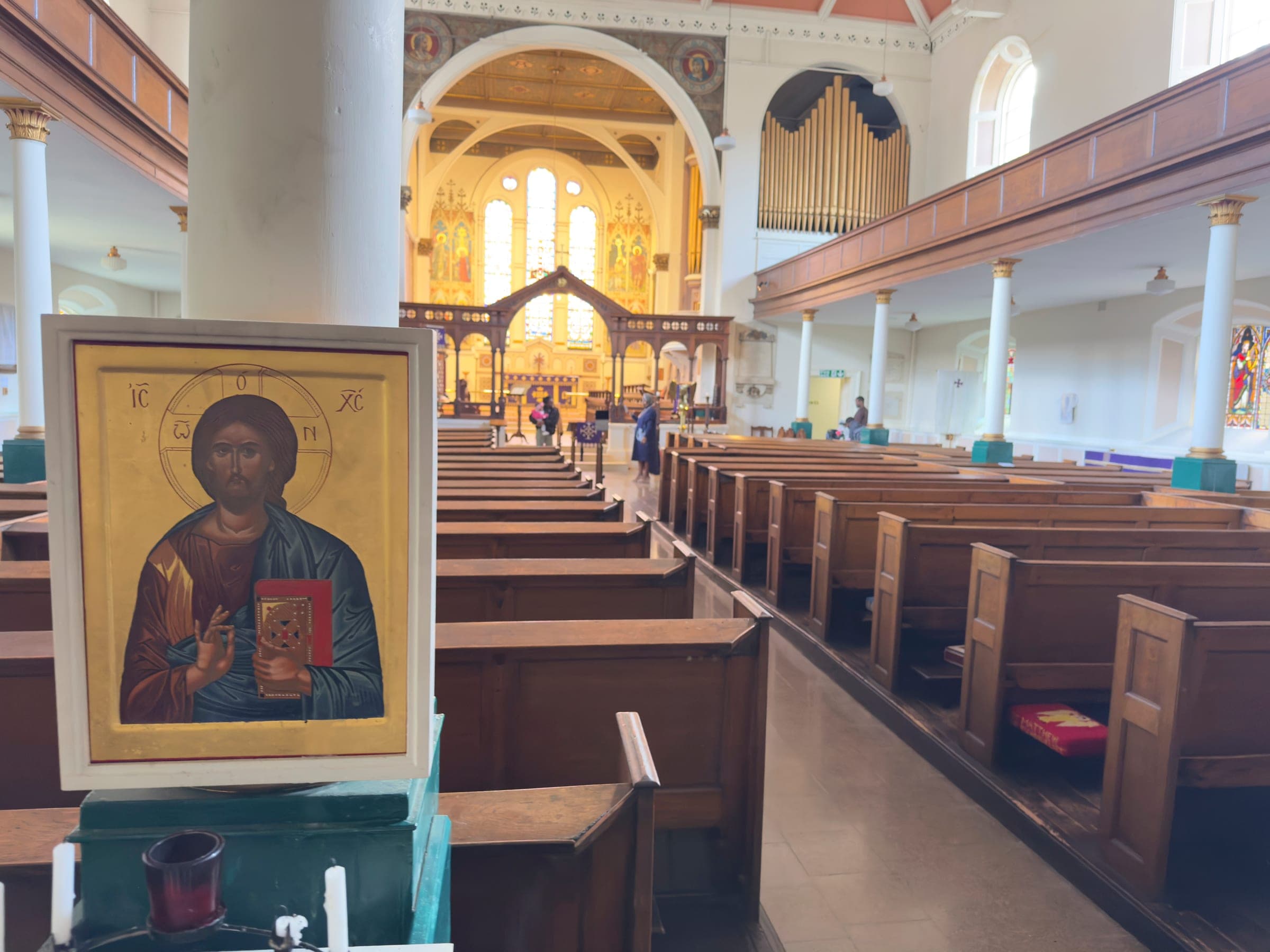An icon of Christ in the nave of St George's, looking towards the chancel